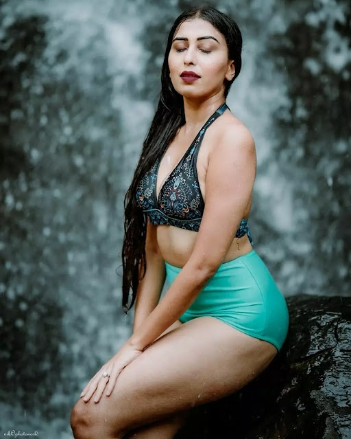 Ruma Sharma in teal halter bikini and turquoise bottoms Ruma Sharma in teal halter bikini and turquoise bottoms