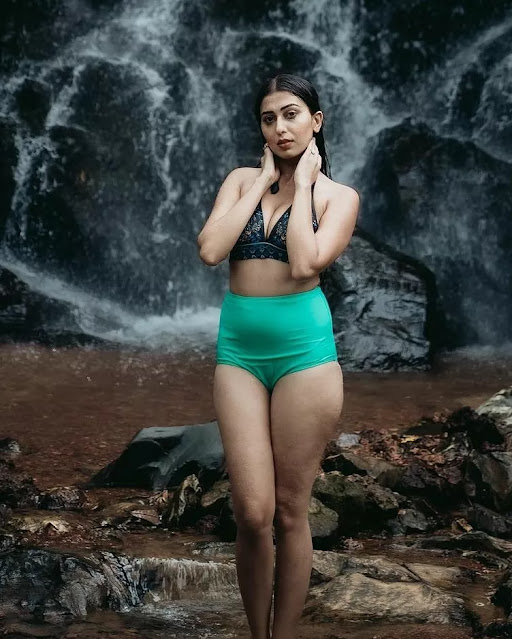 Ruma Sharma in teal halter bikini and turquoise bottoms Ruma Sharma in teal halter bikini and turquoise bottoms
