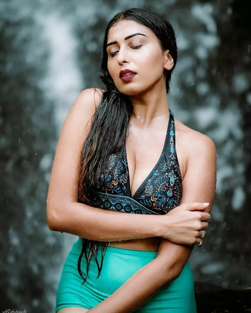 Ruma Sharma in teal halter bikini and turquoise bottoms Ruma Sharma in teal halter bikini and turquoise bottoms