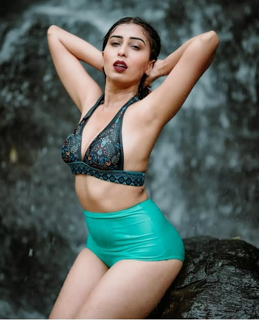 Ruma Sharma in teal halter bikini and turquoise bottoms Ruma Sharma in teal halter bikini and turquoise bottoms
