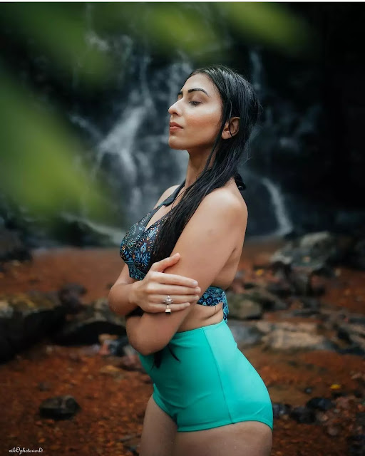 Ruma Sharma in teal halter bikini and turquoise bottoms Ruma Sharma in teal halter bikini and turquoise bottoms