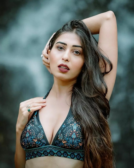 Ruma Sharma in teal halter bikini and turquoise bottoms Ruma Sharma in teal halter bikini and turquoise bottoms
