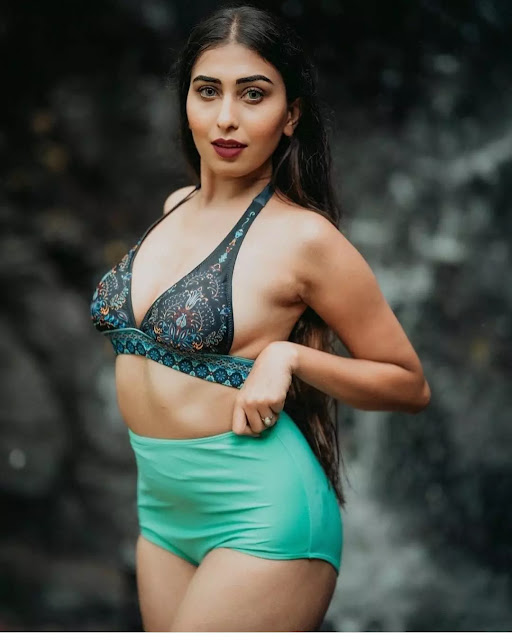 Ruma Sharma in teal halter bikini and turquoise bottoms Ruma Sharma in teal halter bikini and turquoise bottoms