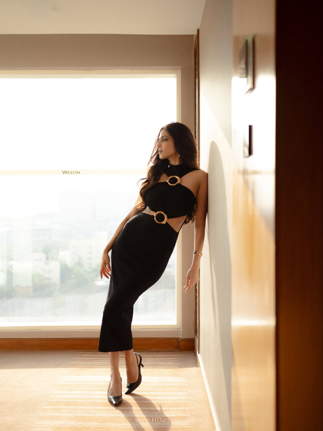 Malavika Mohanan in black halter midi dress Malavika Mohanan in black halter midi dress
