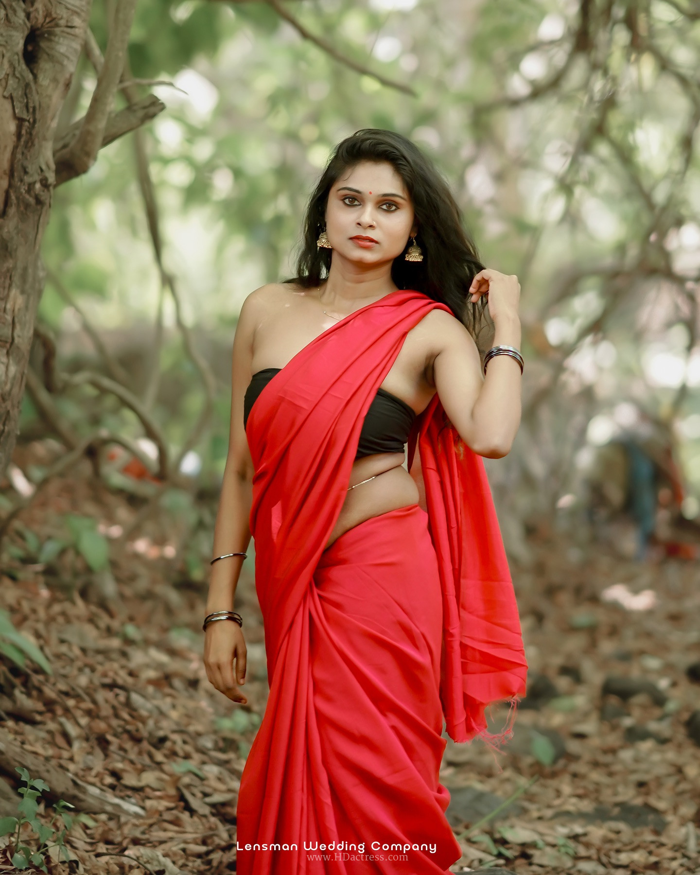 Remya Velayudhan in vibrant red saree Remya Velayudhan in vibrant red saree