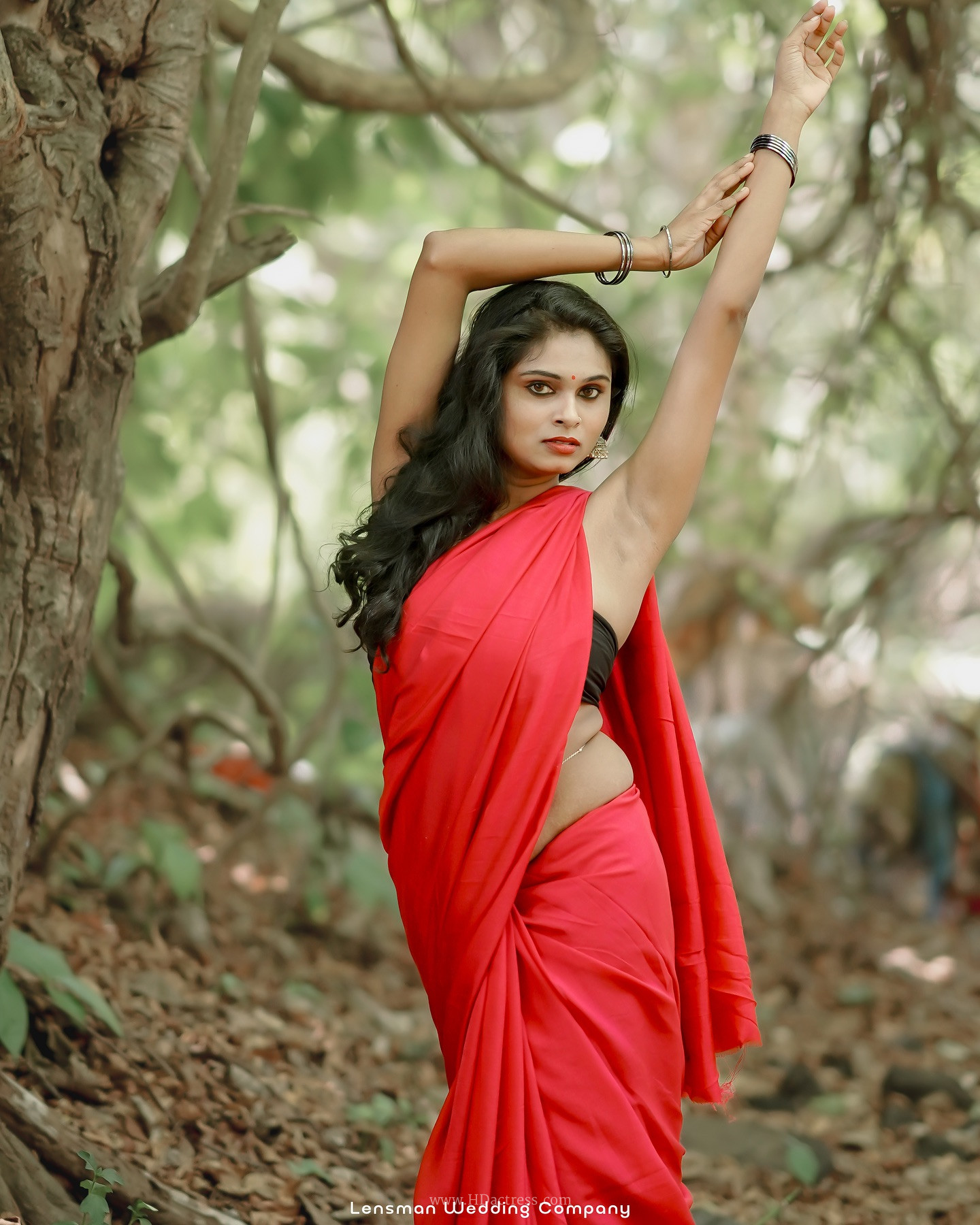 Remya Velayudhan in vibrant red saree Remya Velayudhan in vibrant red saree