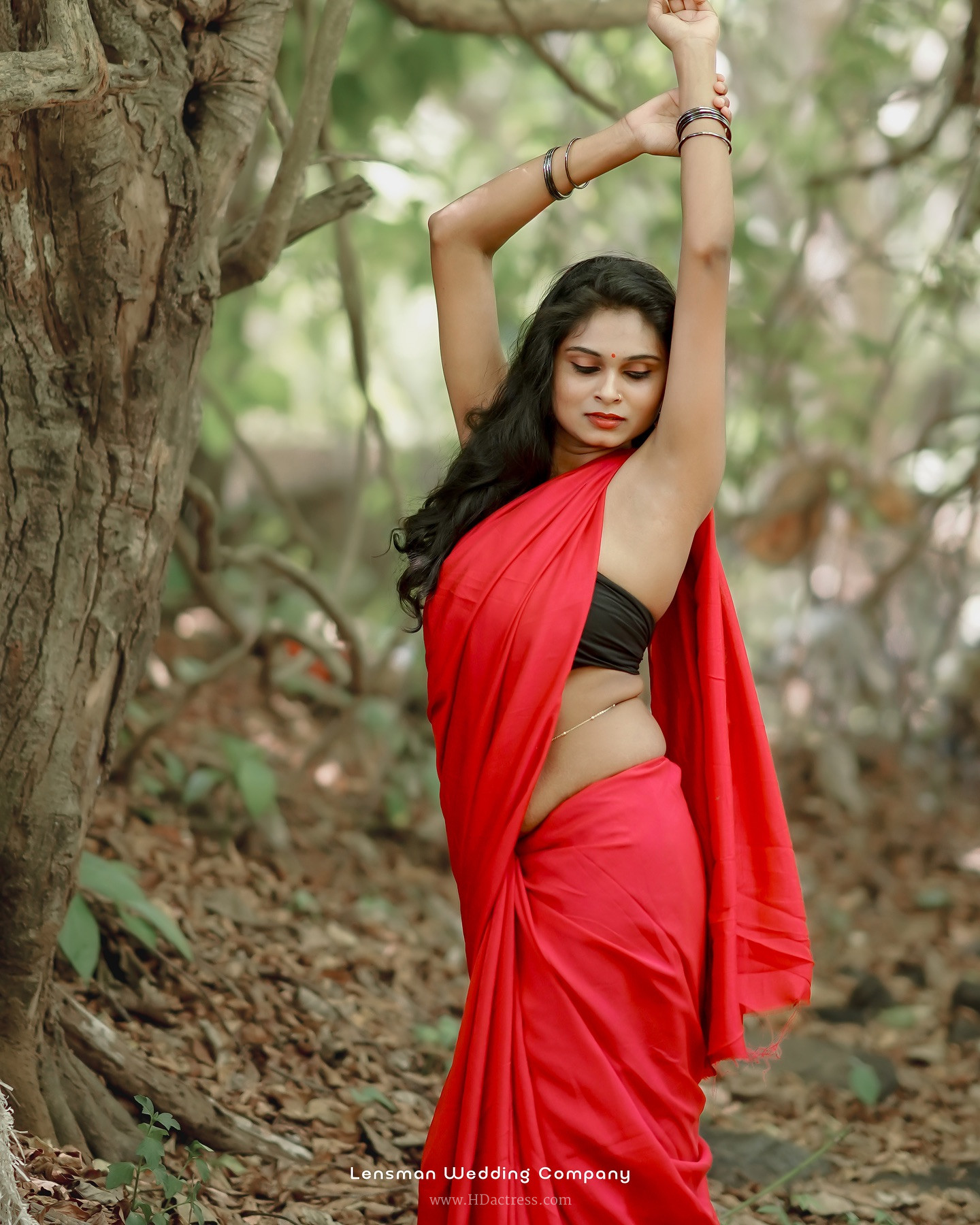 Remya Velayudhan in vibrant red saree Remya Velayudhan in vibrant red saree
