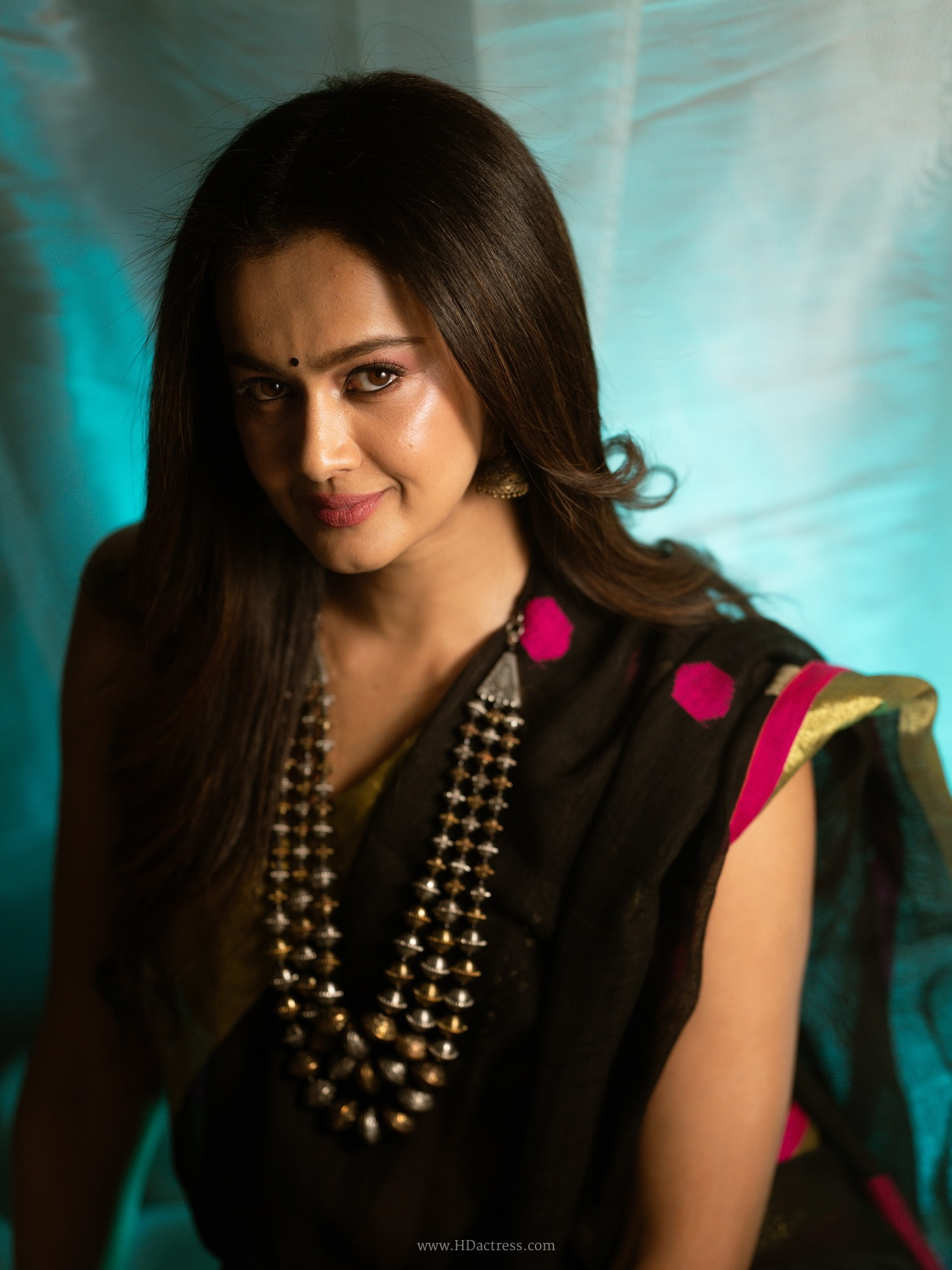 Shubra Aiyappa in black saree with pink zari border Shubra Aiyappa in black saree with pink zari border