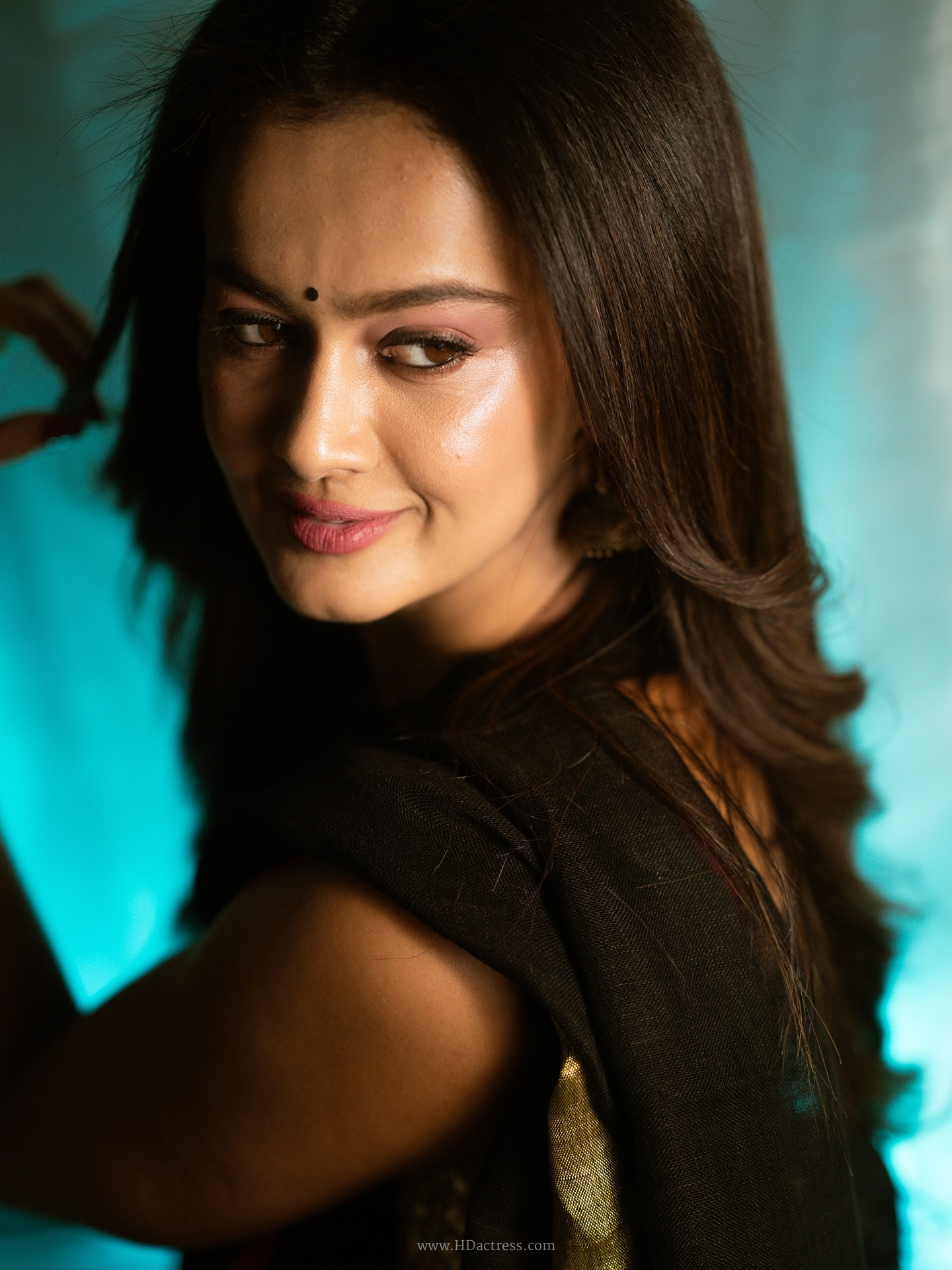 Shubra Aiyappa in black saree with pink zari border Shubra Aiyappa in black saree with pink zari border