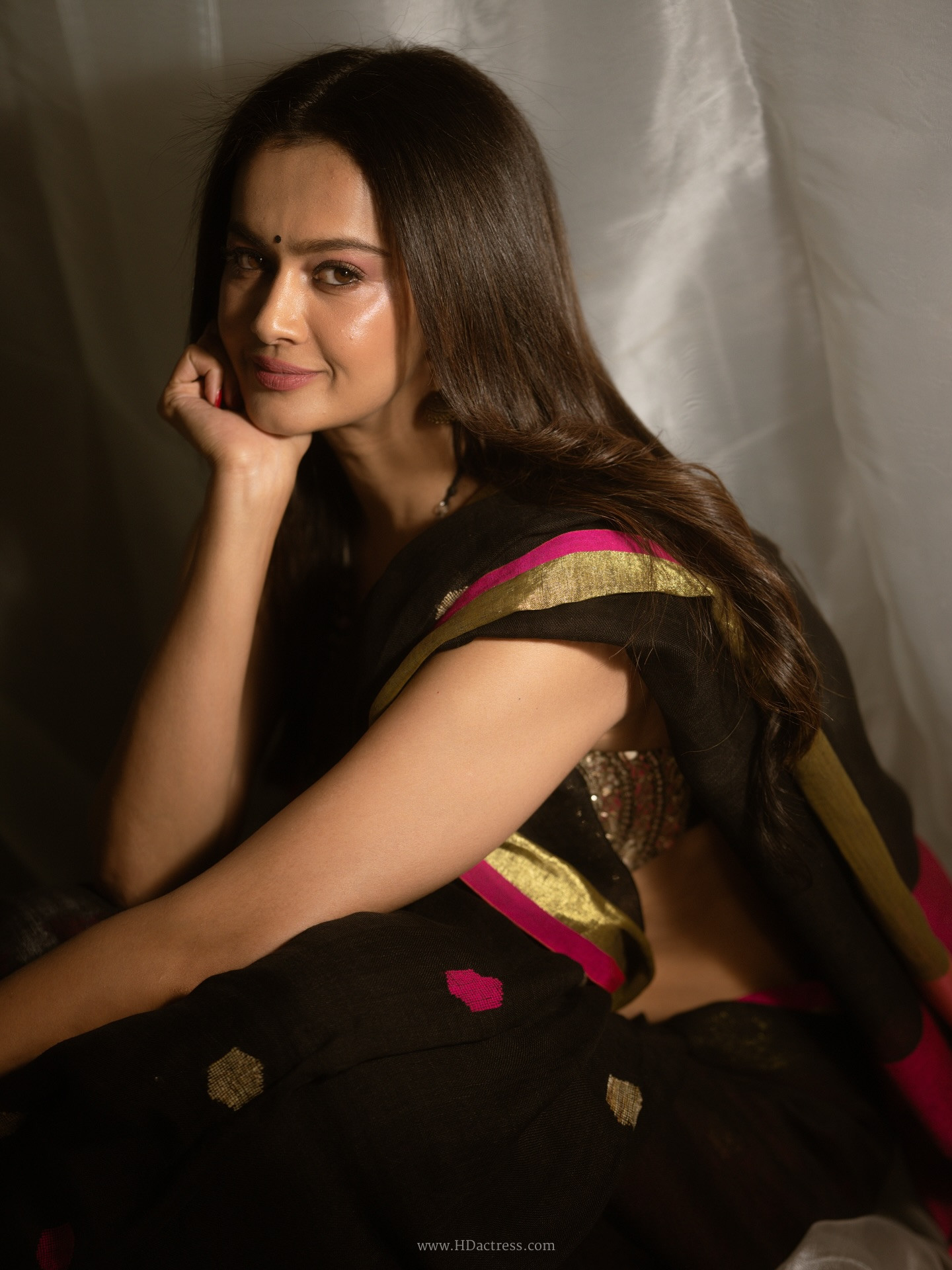 Shubra Aiyappa in black saree with pink zari border Shubra Aiyappa in black saree with pink zari border