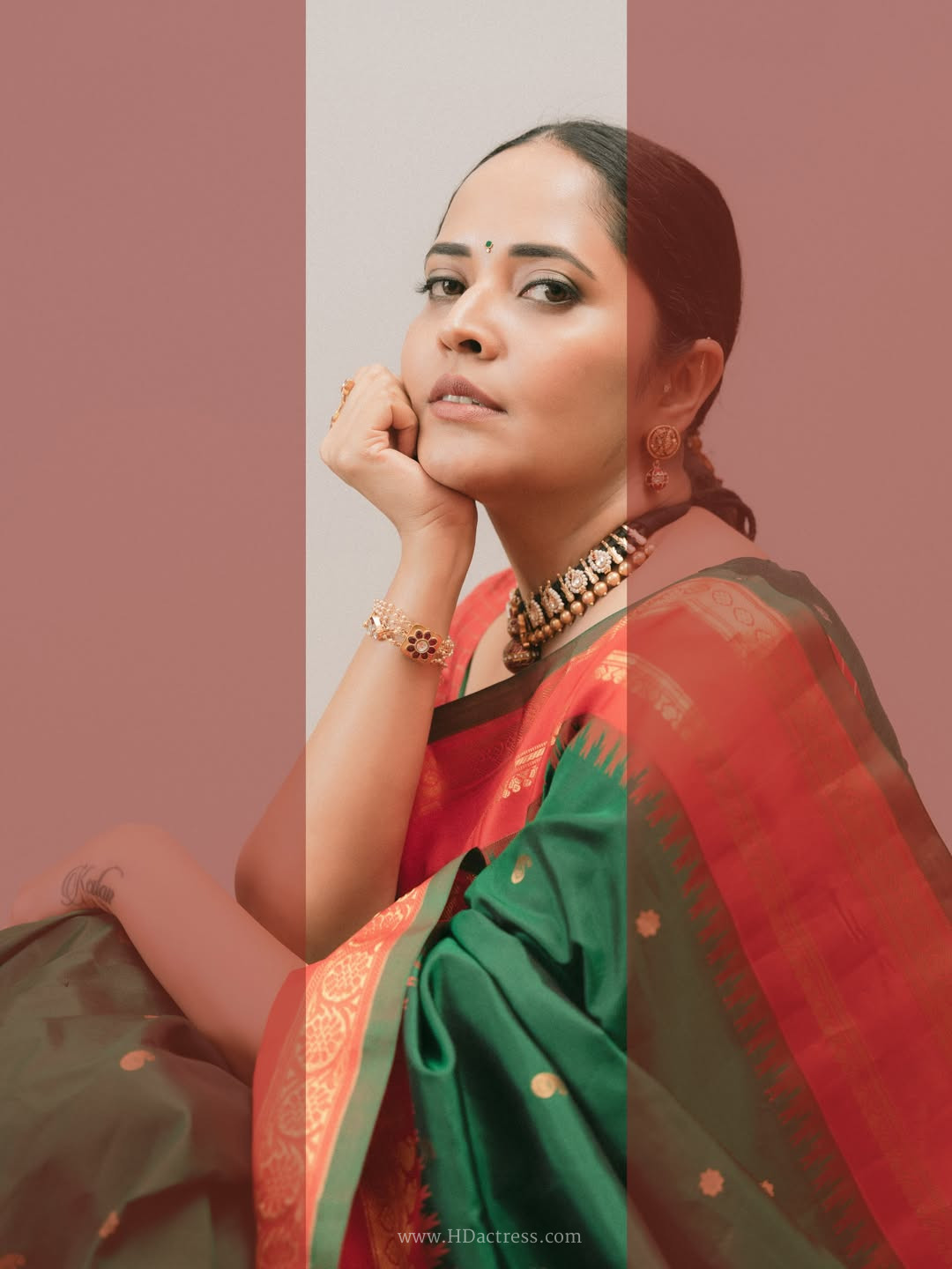 Anasuya Bharadwaj in deep green silk saree Anasuya Bharadwaj in deep green silk saree