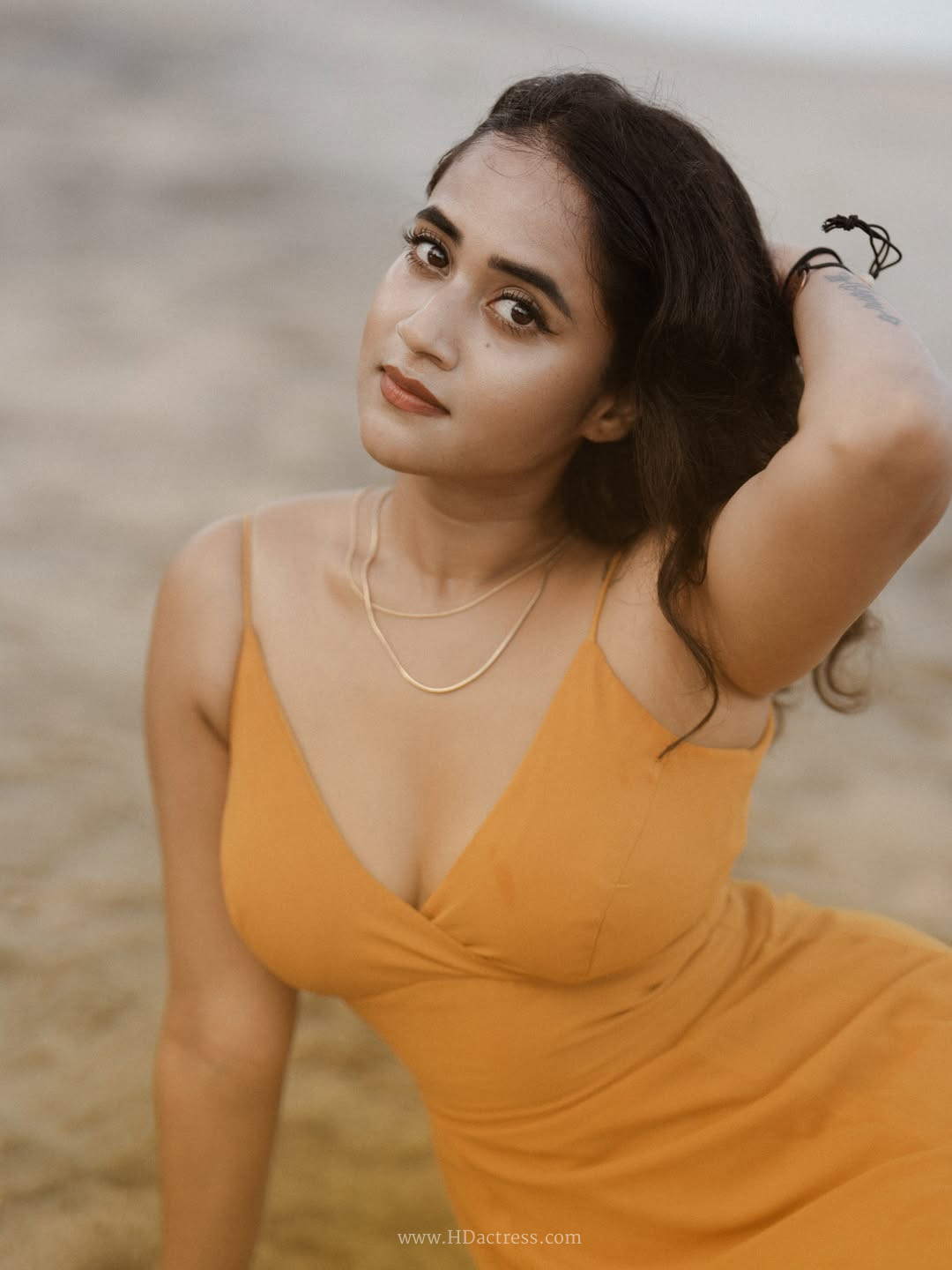 Deepthi Sunaina in mustard yellow slip dress