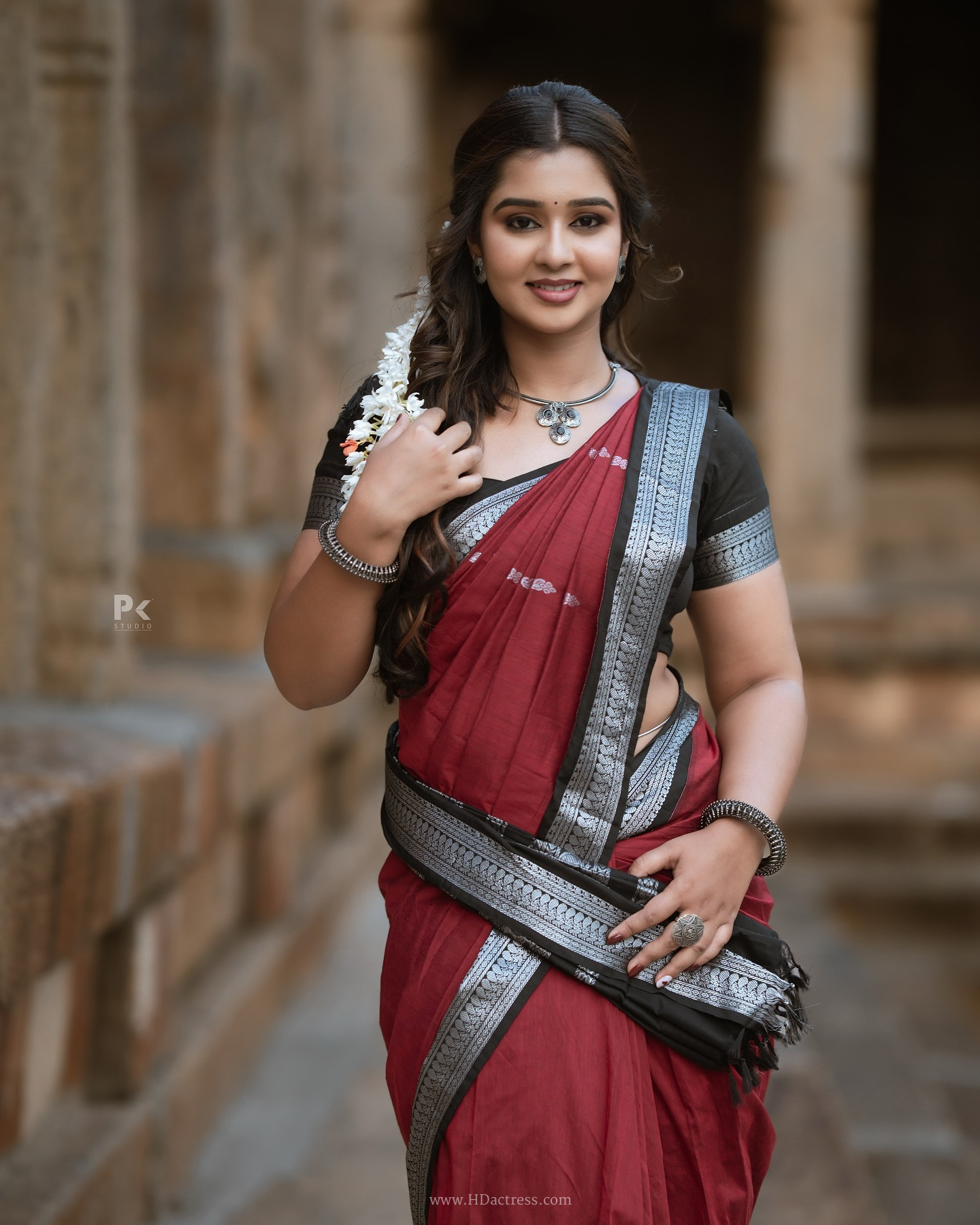 Mouna Guddemane in maroon saree Mouna Guddemane in maroon saree