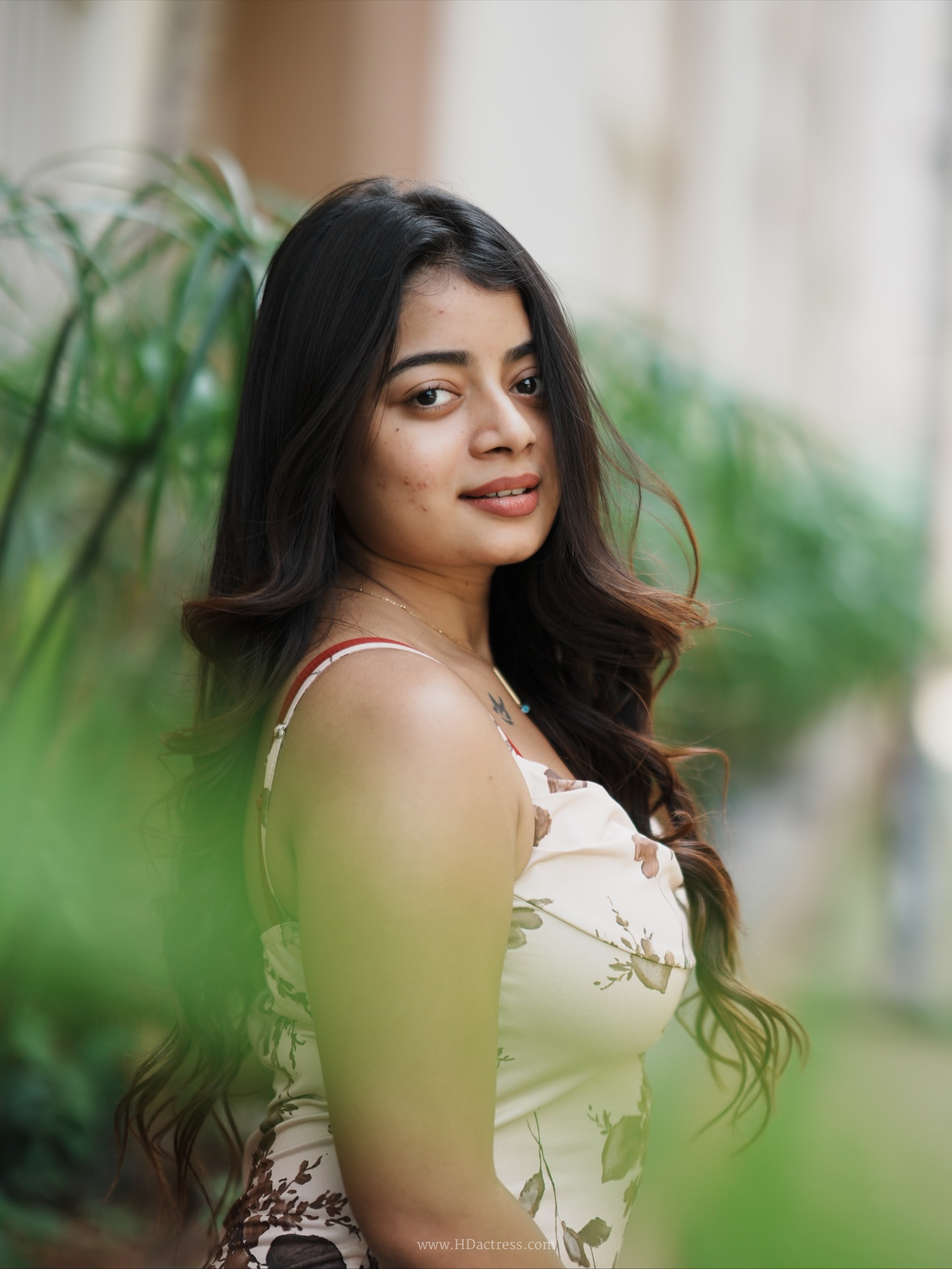 Nainika Anasuru in beige floral slip dress