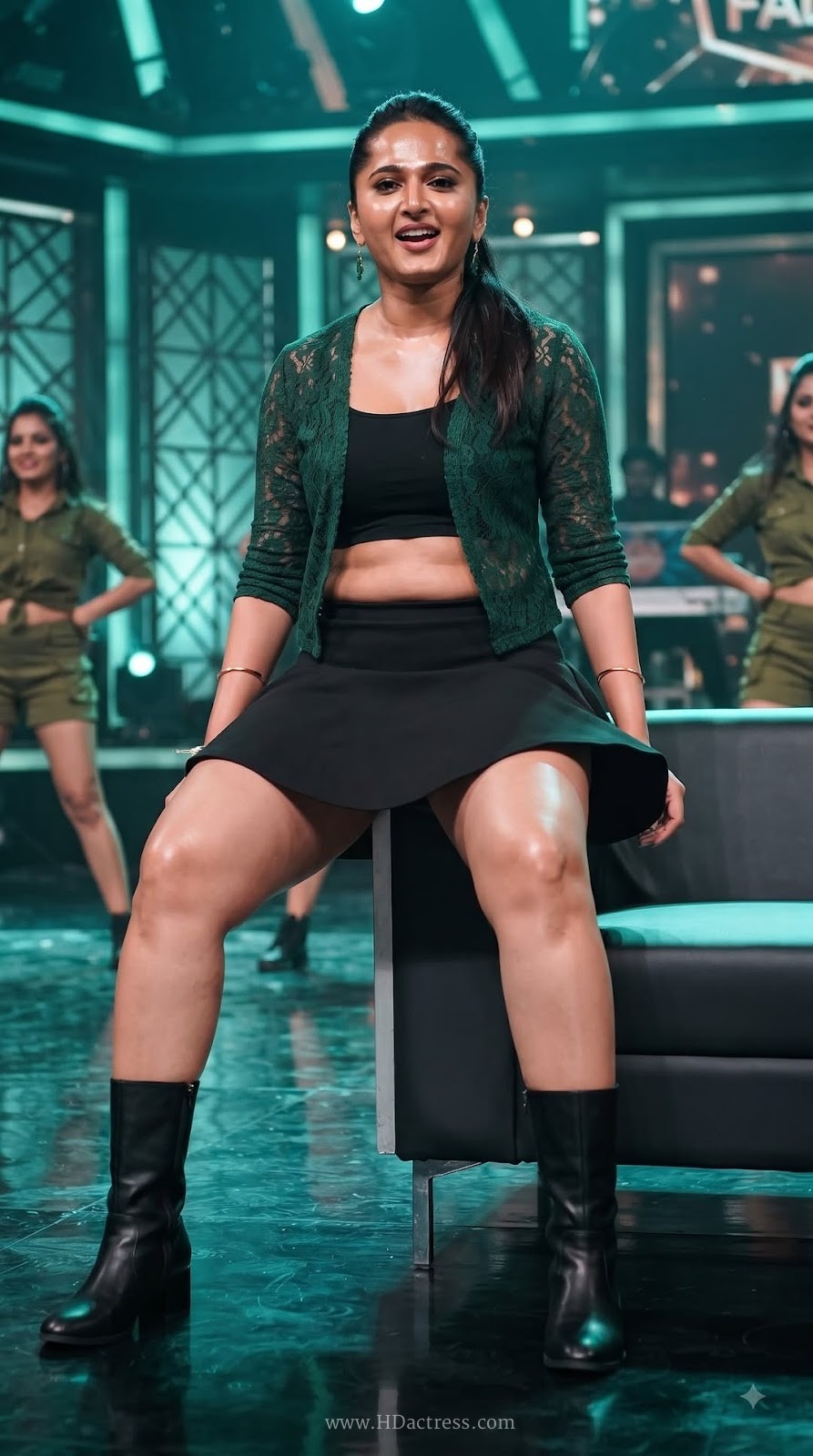Anushka Shetty Sizzles in Green Lace Top and Black Skirt – Singam 2 Movie Stills - Image 5 `Anushka Shetty hot dance gallery`