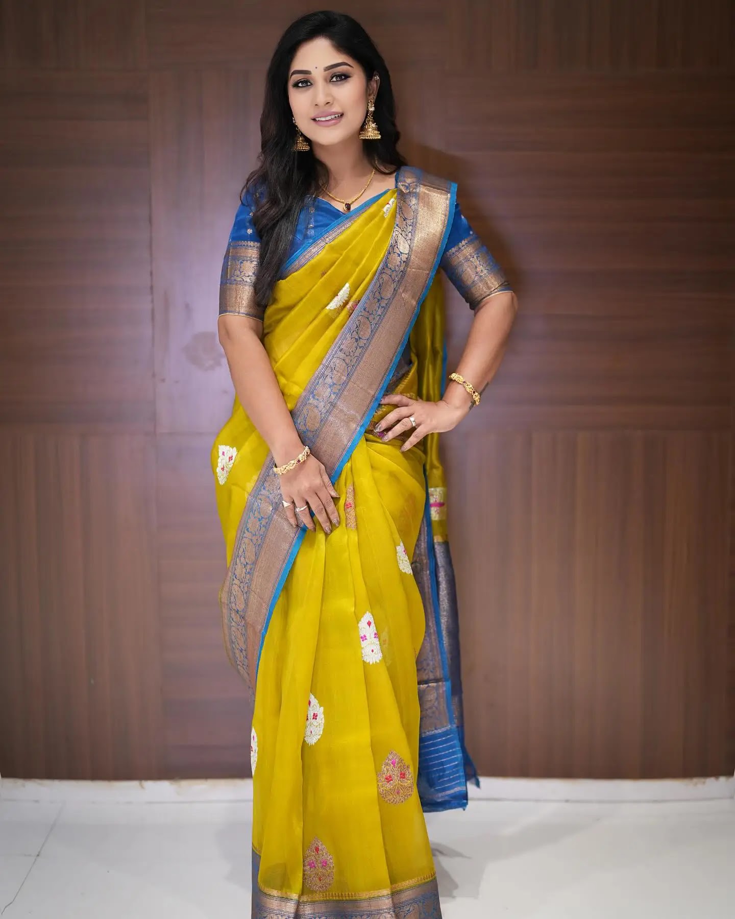 Manjula Paritala Wearing Jewellery Yellow Saree Blue Blouse - Image 1