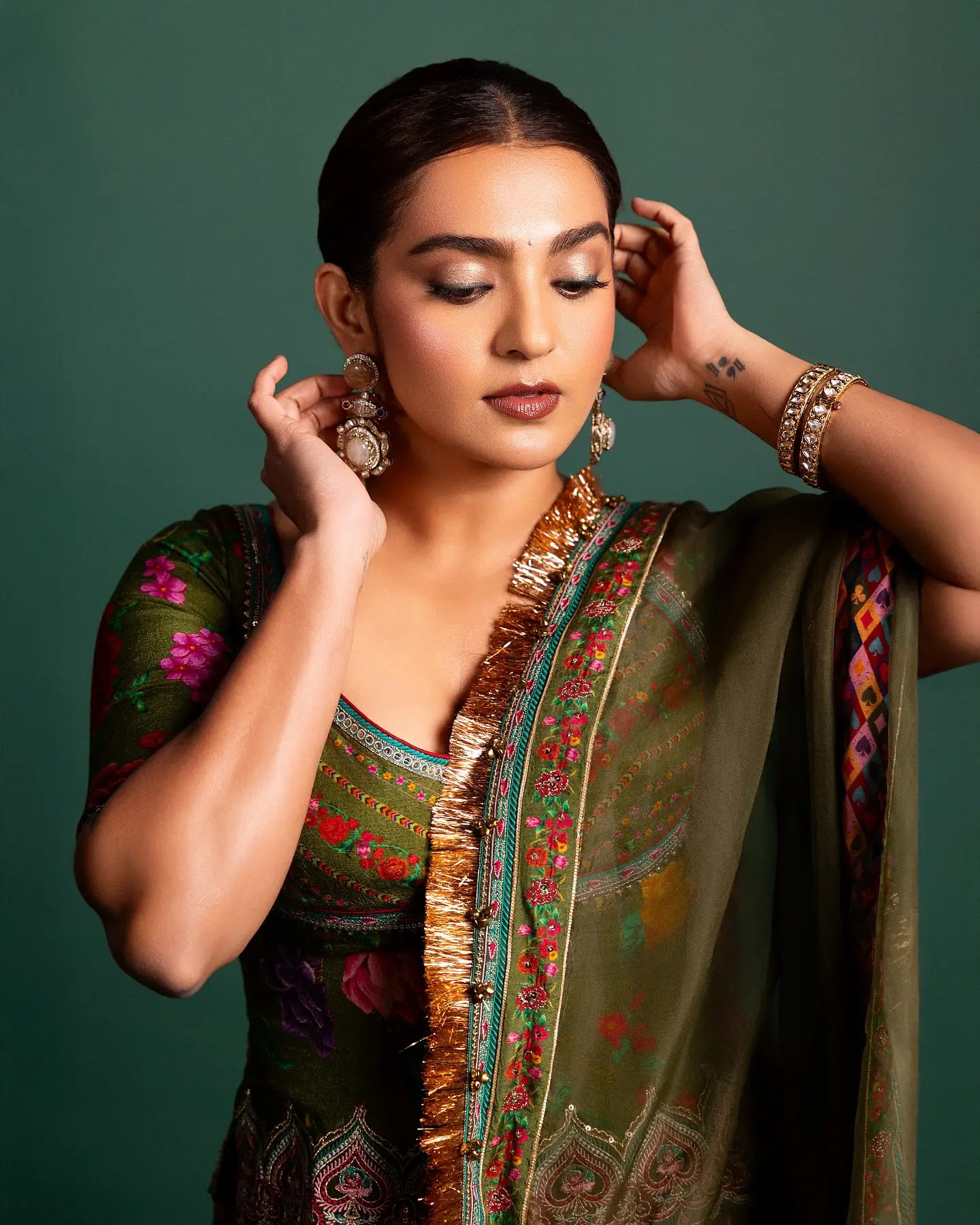 Emerald Grace – Parvathy Thiruvothu in a Green Designer Dress - Image 1
