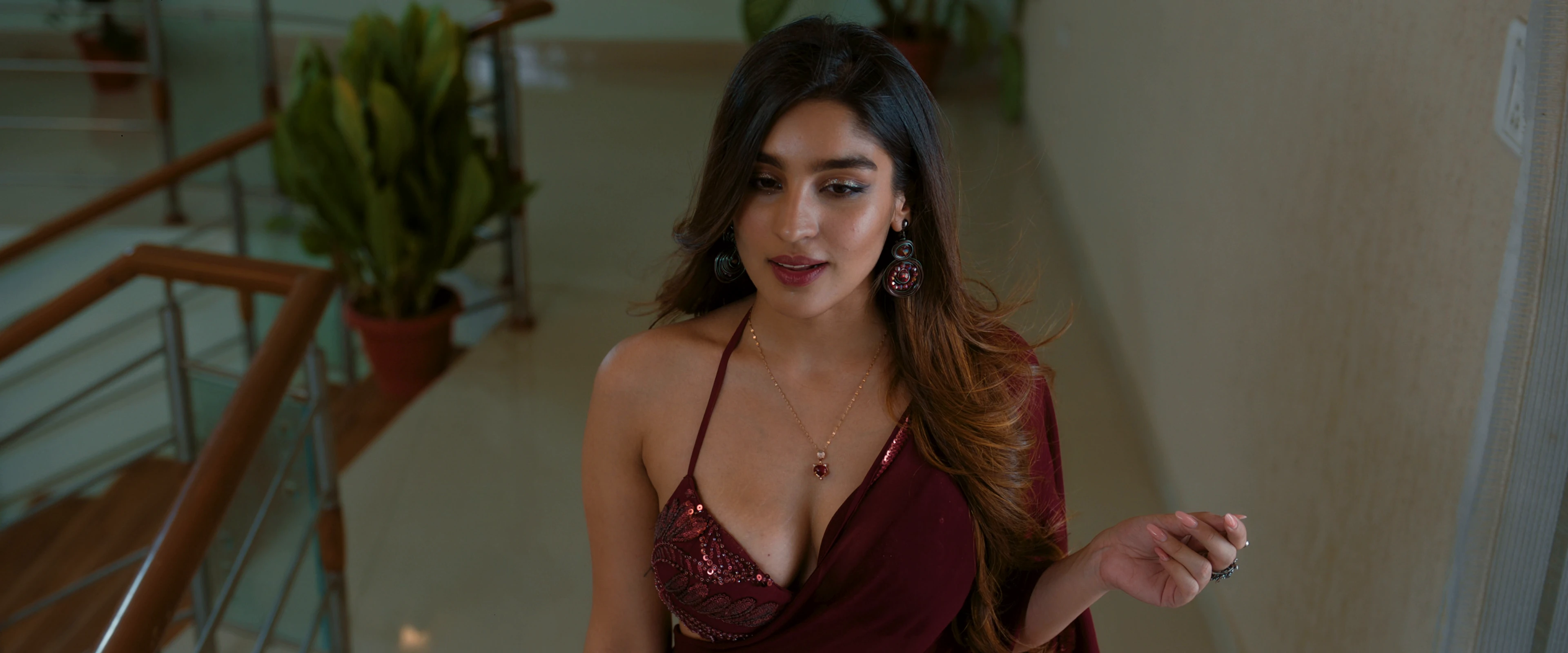 Yukti Thareja Stuns in Bold Red Deepneck Blouse at KJQ