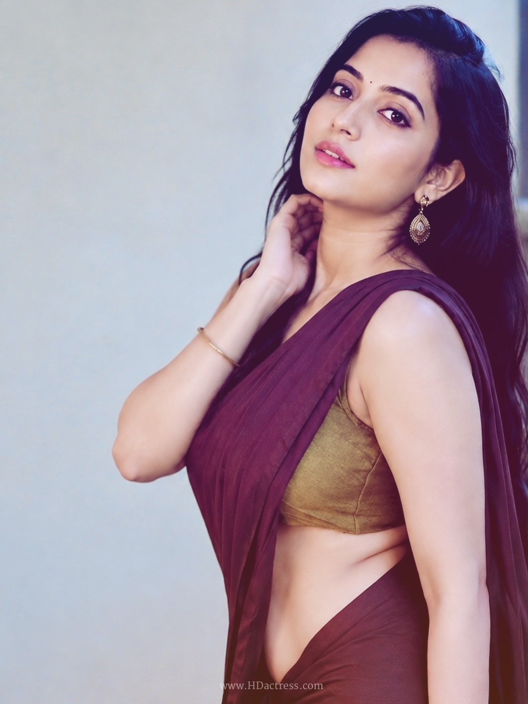 Genzera in dark purple saree and olive green blouse Genzera in dark purple saree and olive green blouse