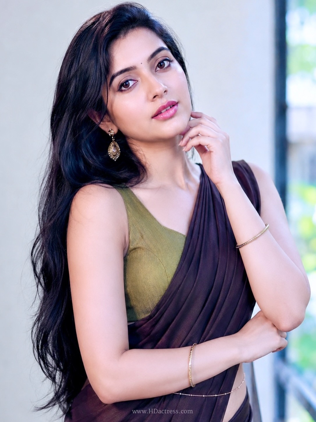 Genzera in dark purple saree and olive green blouse Genzera in dark purple saree and olive green blouse