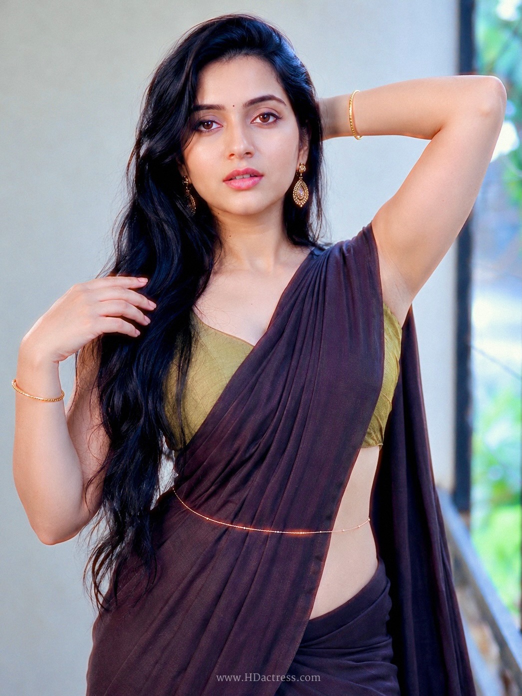 Genzera in dark purple saree and olive green blouse Genzera in dark purple saree and olive green blouse
