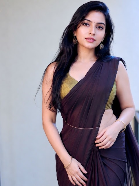 Genzera in dark purple saree and olive green blouse