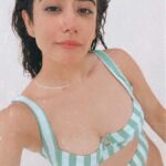 Jonita Gandhi Showing Sculpted Body in Green Bikini Latest Photos