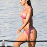 Pinned: Chantel Jeffries wears a vibrant pink string bikini while enjoying a sunny beach day in Mykonos.