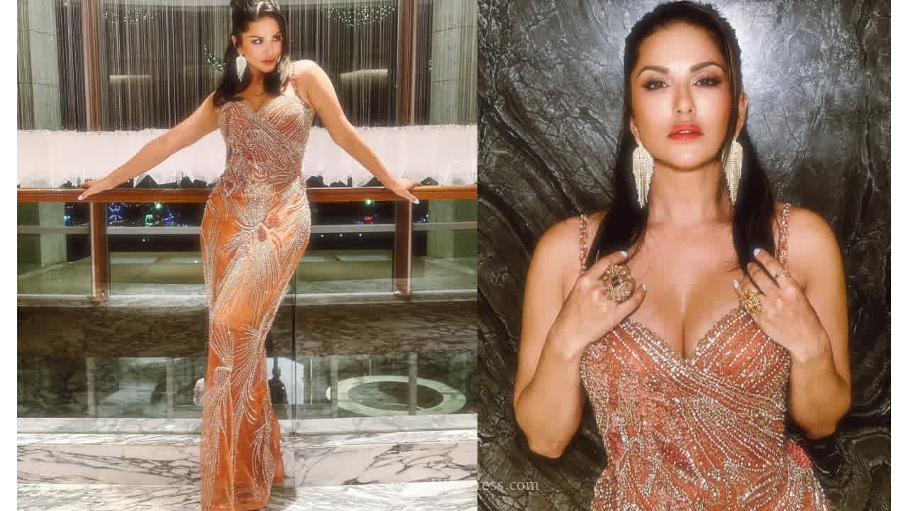 Sunny Leone Gives Cute Poses  In Sleeveless Rust Orange Embellished Gown