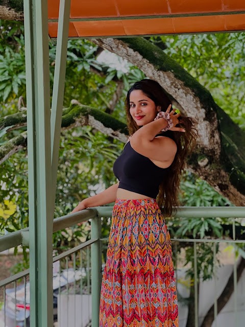 Rosmin Thadathil in black crop top and ikat maxi skirt Rosmin Thadathil in black crop top and ikat maxi skirt