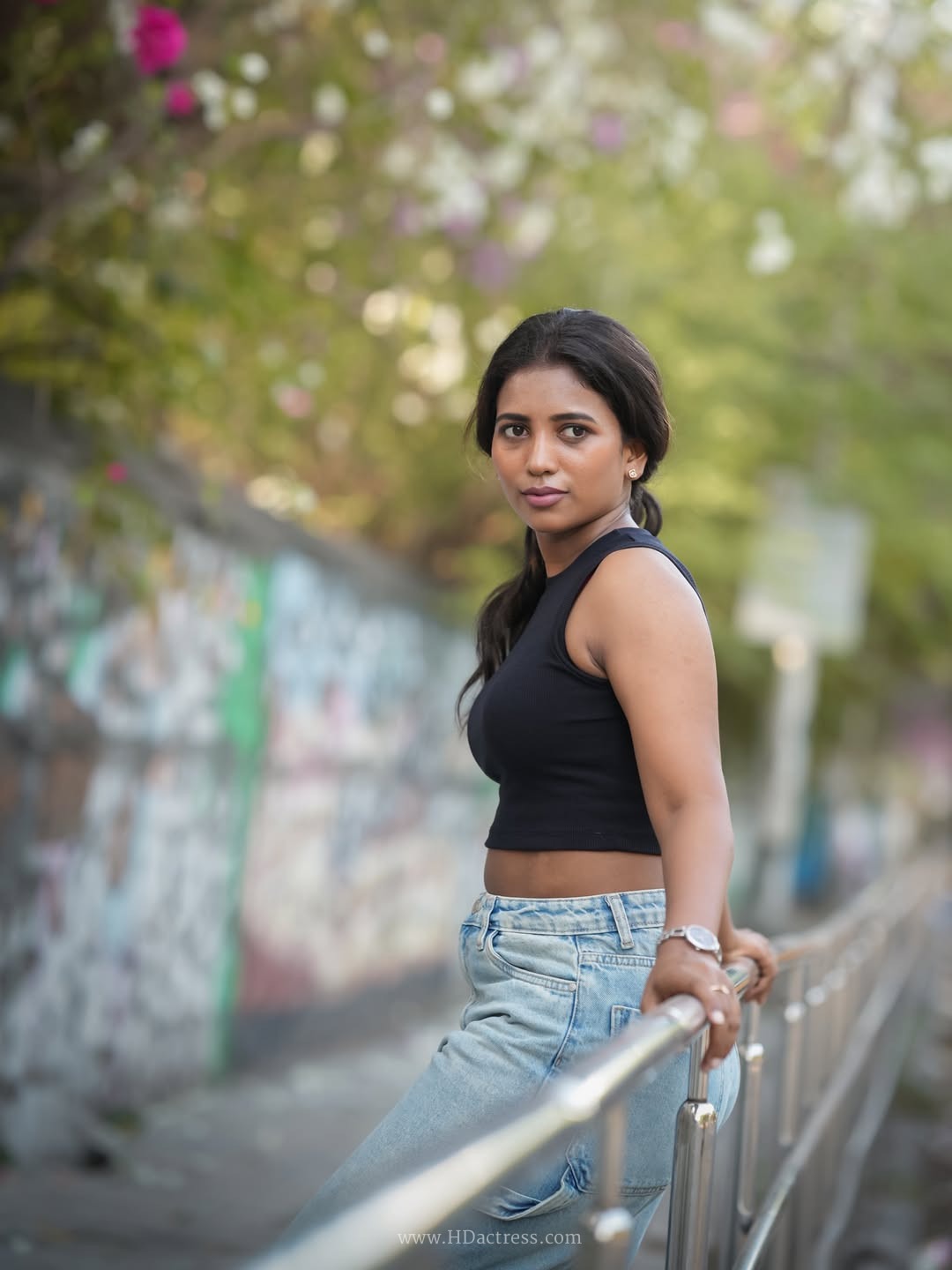 Pavithra Chakkravarthy in black crop top and wide-leg jeans
