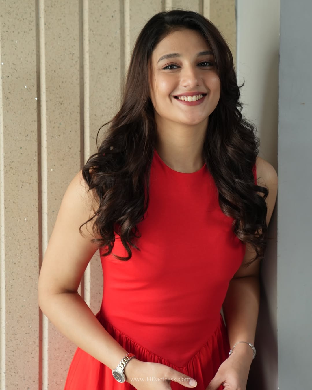 Ritika Nayak in vibrant red sleeveless midi dress Ritika Nayak in vibrant red sleeveless midi dress