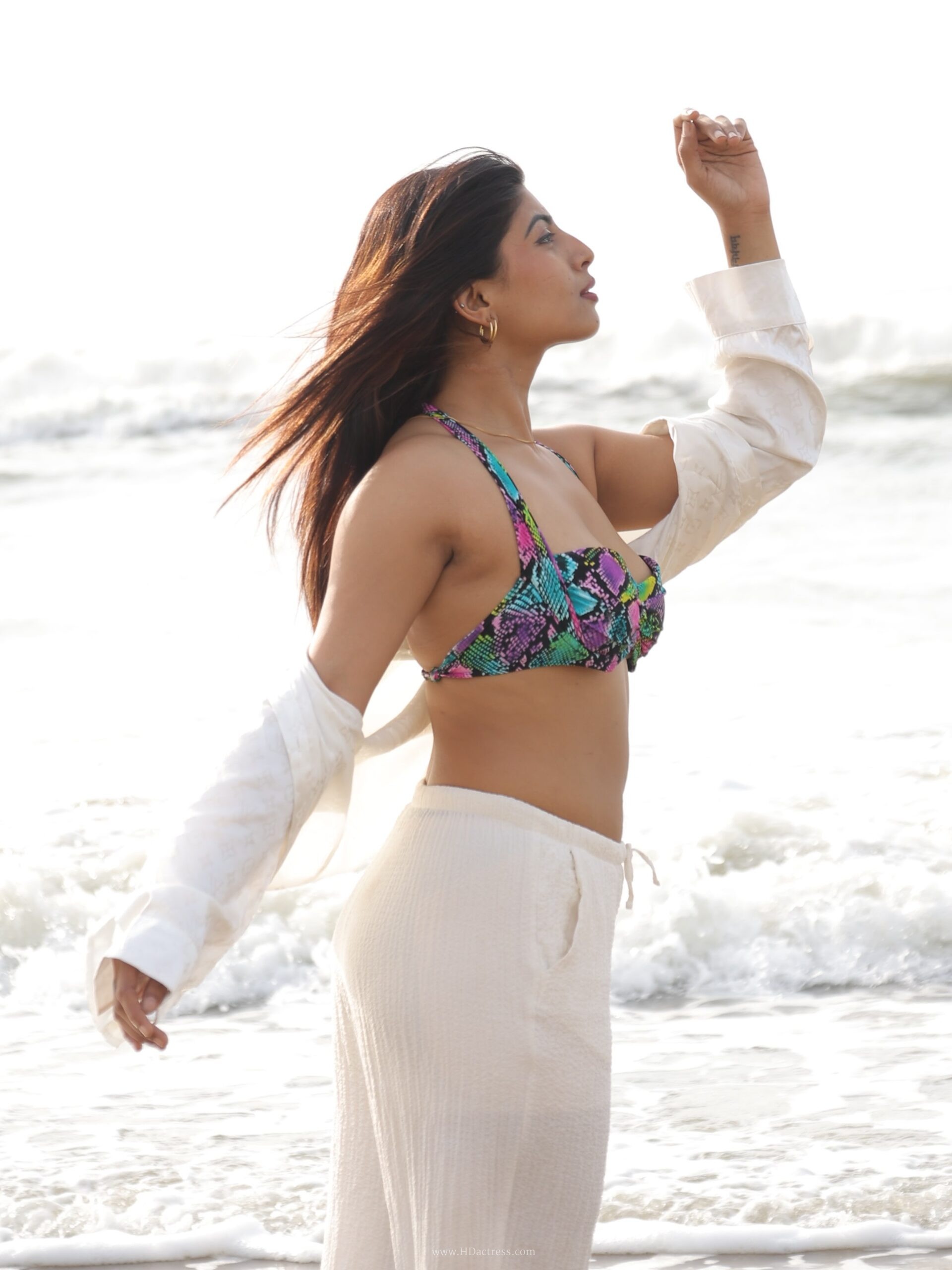 Shyamal Dattaraj photos, multi-colored patterned bikini top, sexy bikini pictures, viral model photoshoot, Chennai actress hot pics, patterned swimsuit images, beach bikini looks