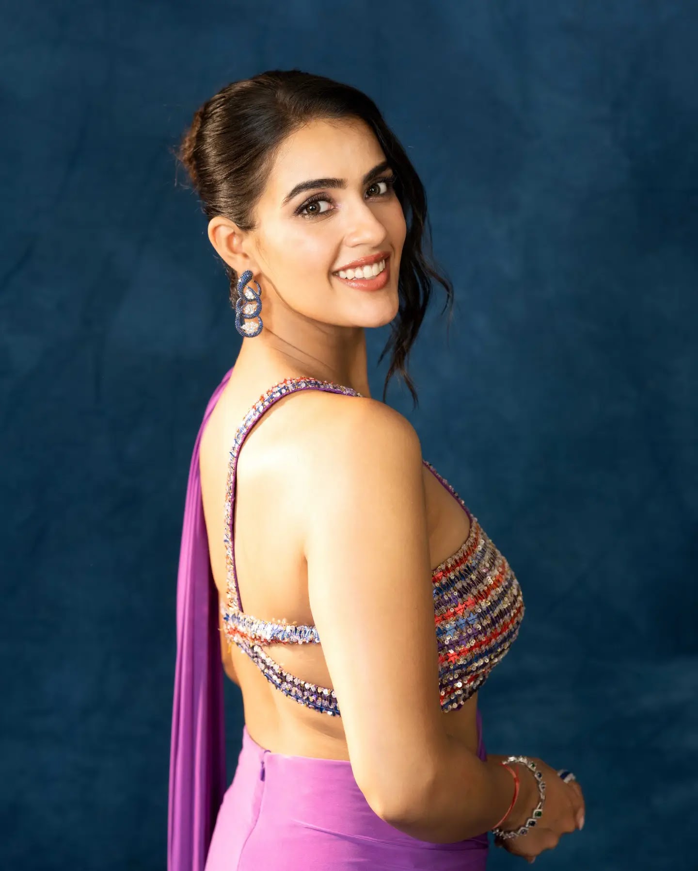 Indian Actress Kavya Thapar In Violet Lehenga Choli - Image 1
