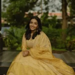 Rajisha20vijayan20stills20in20yellow20dress20281229