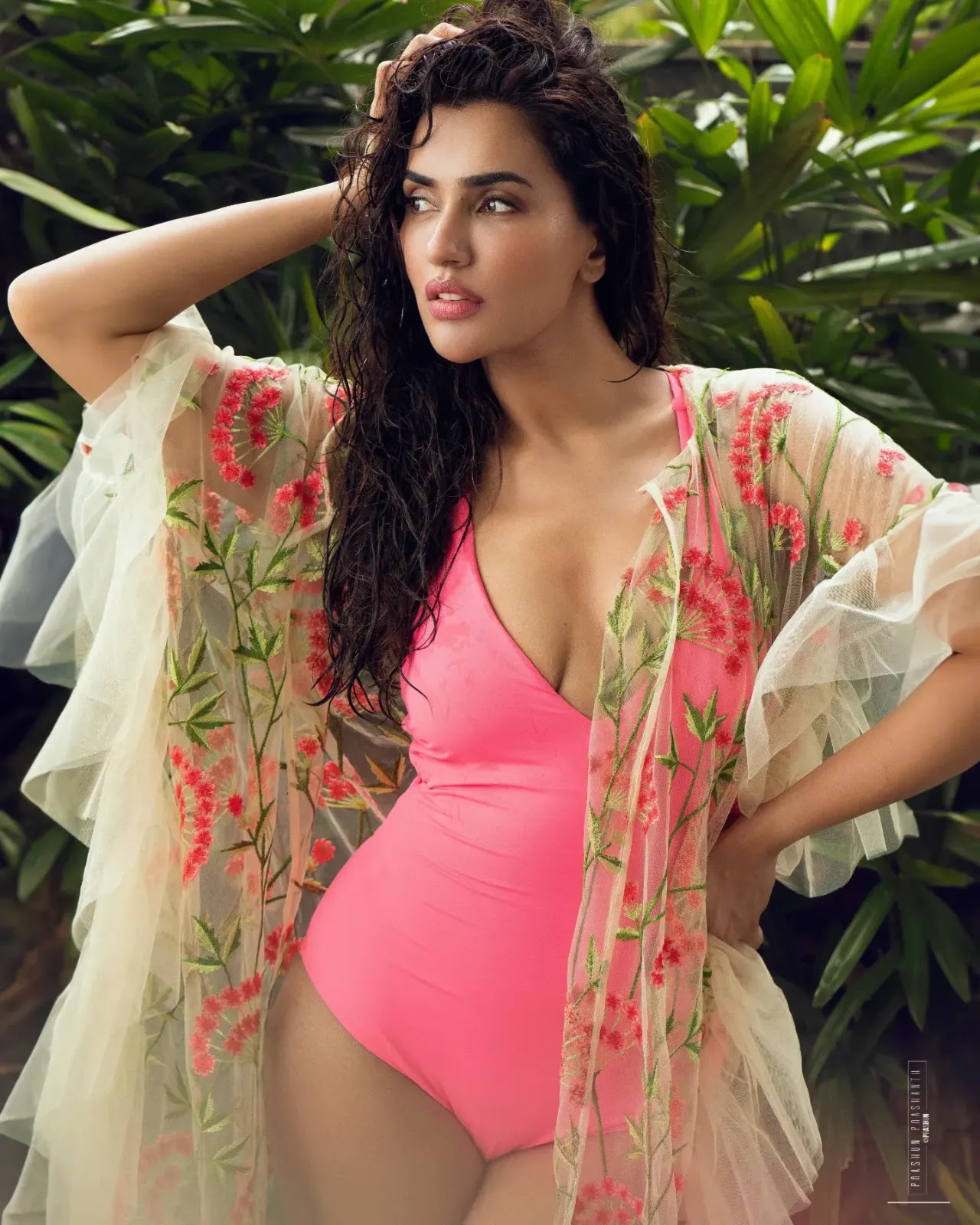 Akshara Gowda wearing pink resortwear with cream mesh kimono Akshara Gowda wearing pink resortwear with cream mesh kimono