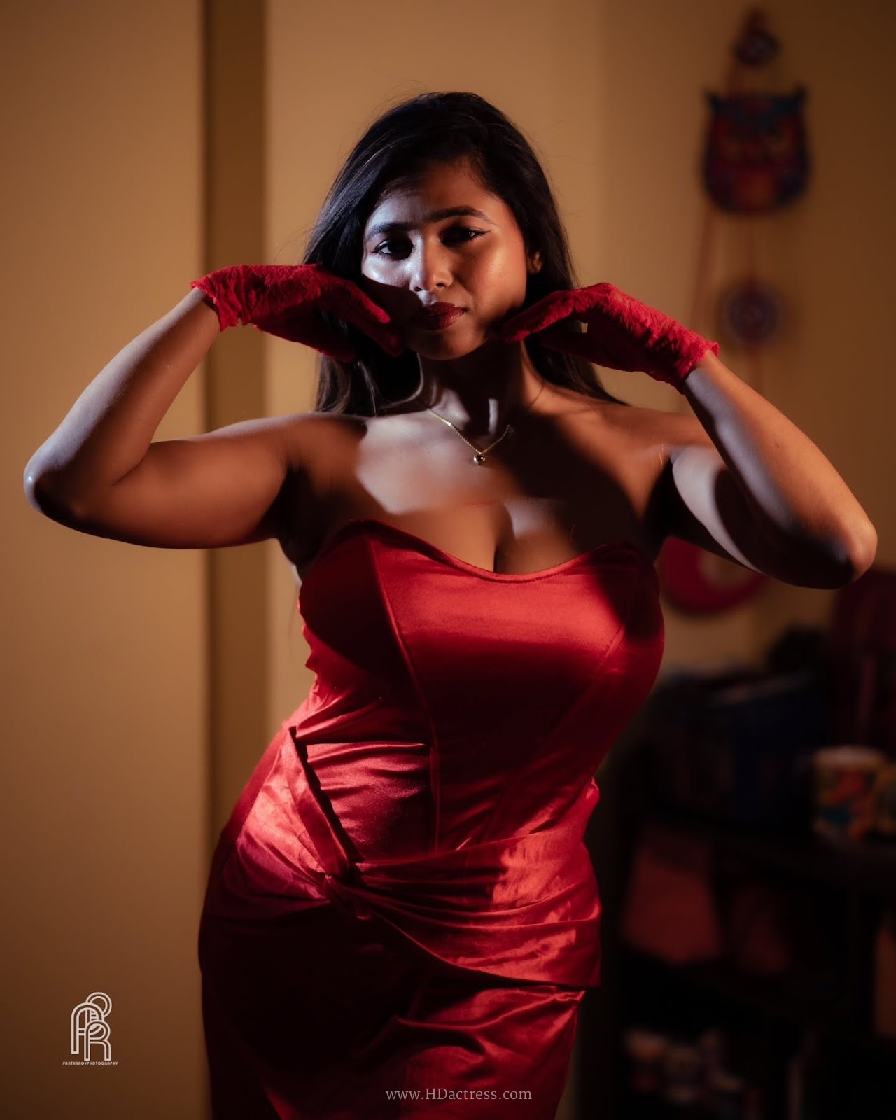Shipra Tarafder wearing a fitted strapless red satin dress Shipra Tarafder wearing a fitted strapless red satin dress