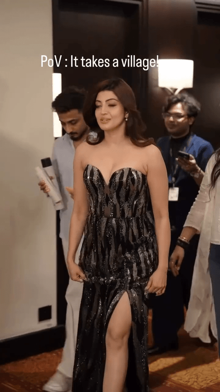 Get a detailed look at Pranitha Subhash in a high-fashion black strapless sweetheart gown decorated with intricate shimmering geometric sequins.