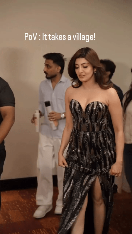 Close-up of Pranitha Subhash in a sparkling black geometric sequin dress with sweetheart neckline