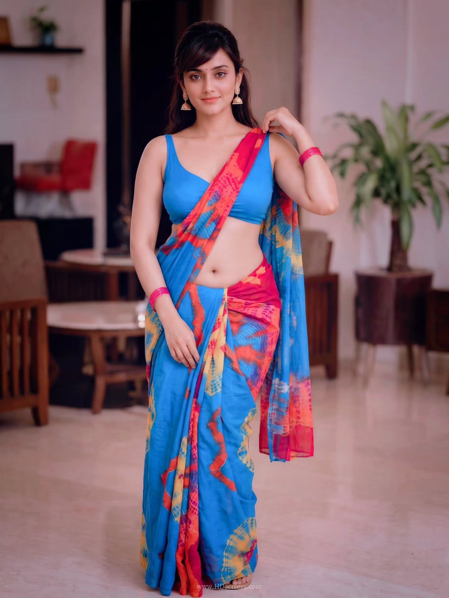 Zayana Vaani wearing colorful tie dye saree with sky blue blouse Zayana Vaani wearing colorful tie dye saree with sky blue blouse