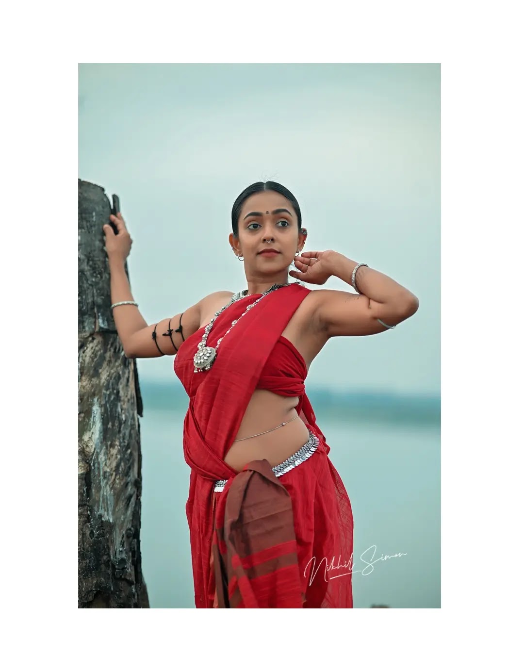 Adithi Chinnu wearing rust red and maroon draped saree Adithi Chinnu wearing rust red and maroon draped saree
