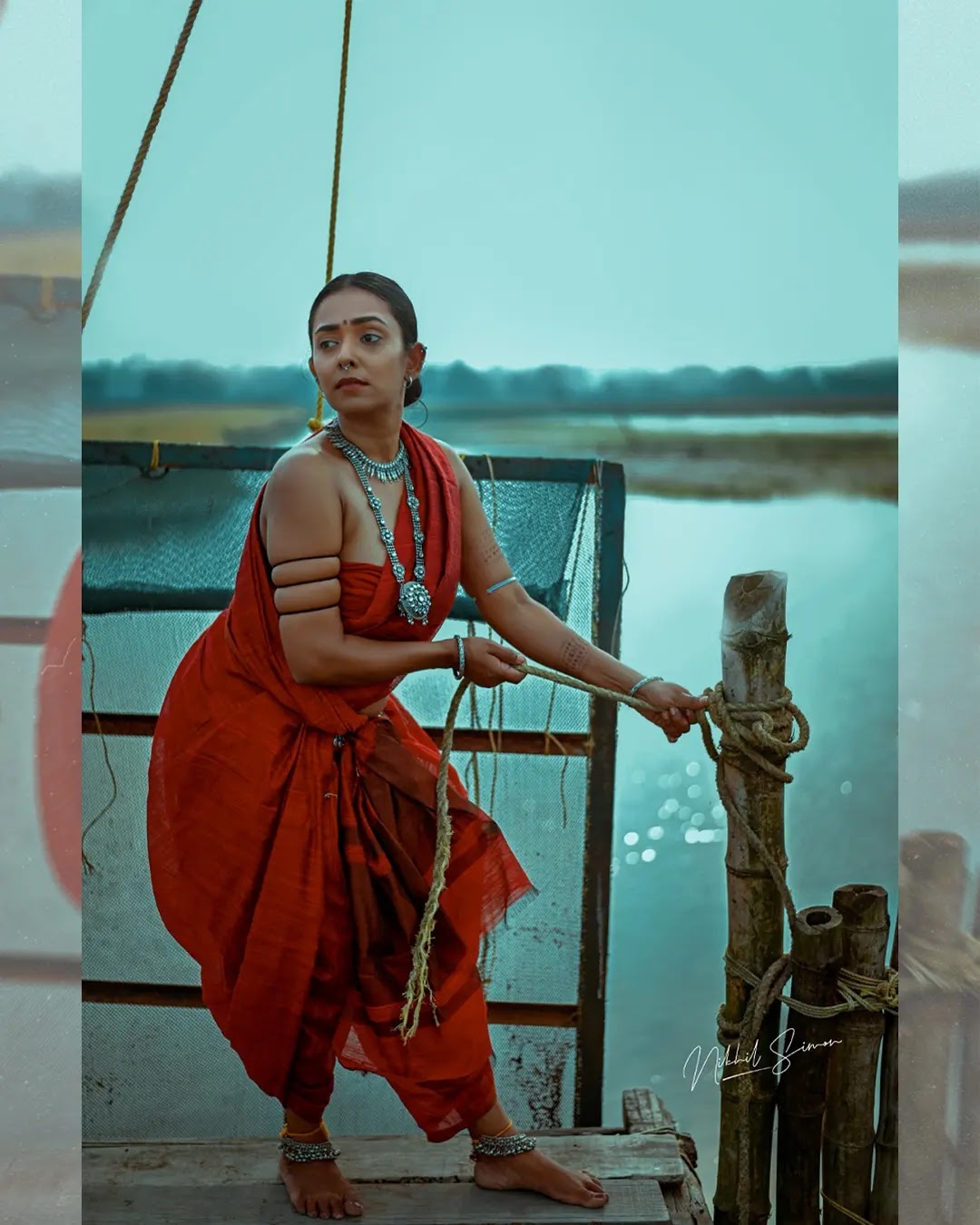 Adithi Chinnu wearing rust red and maroon draped saree Adithi Chinnu wearing rust red and maroon draped saree