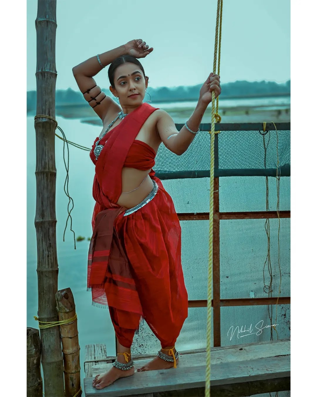 Adithi Chinnu wearing rust red and maroon draped saree Adithi Chinnu wearing rust red and maroon draped saree