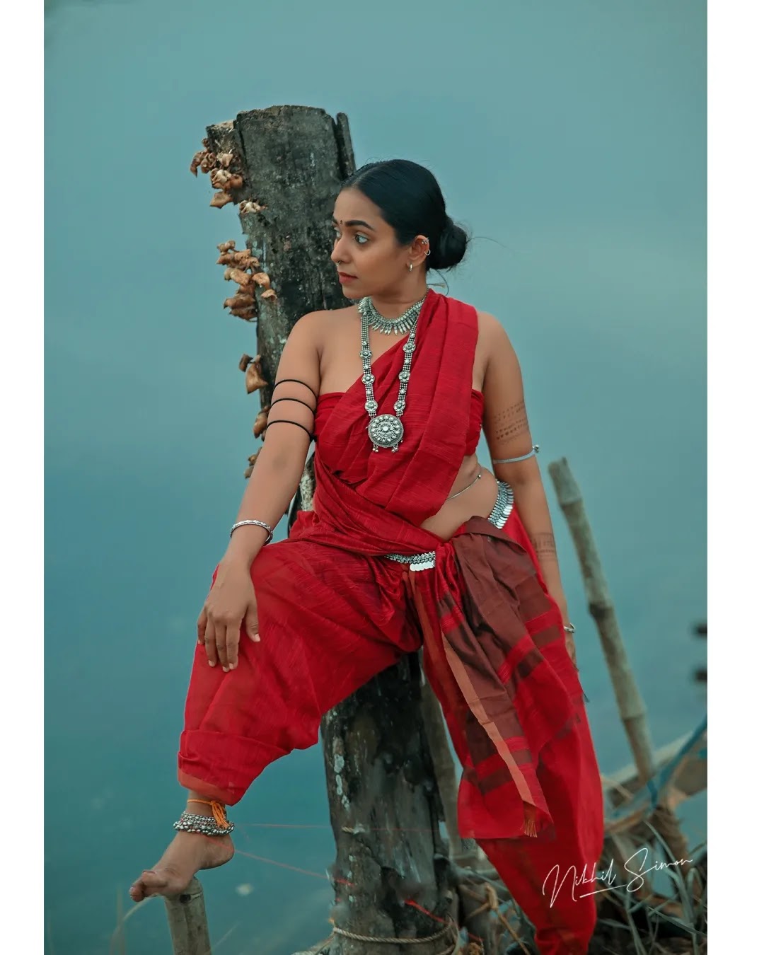 Adithi Chinnu wearing rust red and maroon draped saree Adithi Chinnu wearing rust red and maroon draped saree