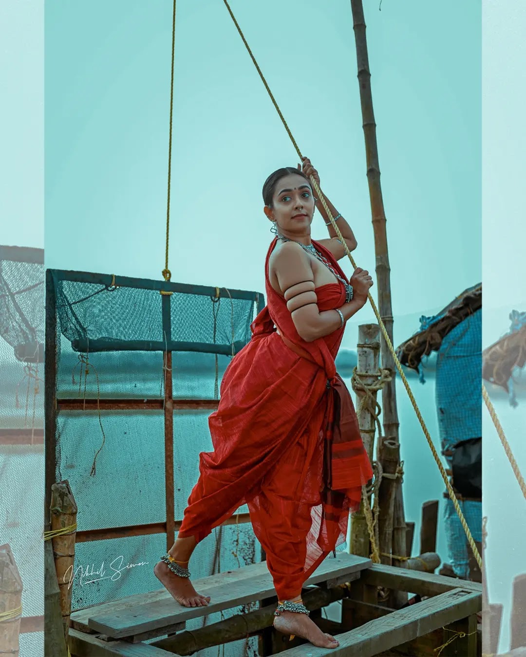 Adithi Chinnu wearing rust red and maroon draped saree Adithi Chinnu wearing rust red and maroon draped saree