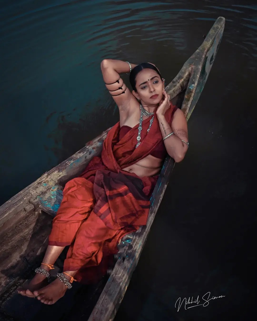 Adithi Chinnu wearing rust red and maroon draped saree Adithi Chinnu wearing rust red and maroon draped saree