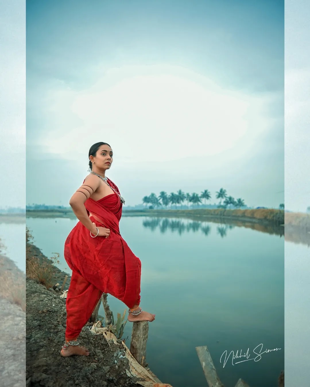 Adithi Chinnu wearing rust red and maroon draped saree Adithi Chinnu wearing rust red and maroon draped saree