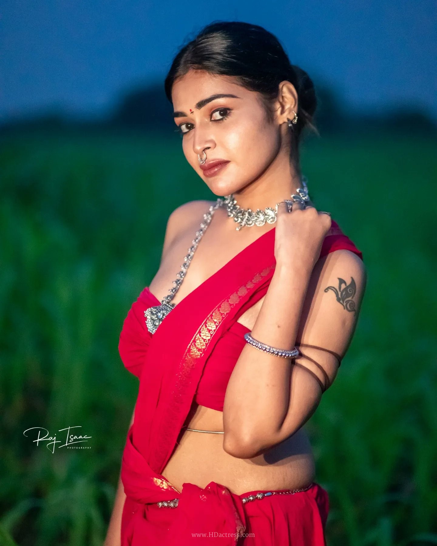 Dharsha Gupta wearing vibrant crimson red saree with matching blouse Dharsha Gupta wearing vibrant crimson red saree with matching blouse