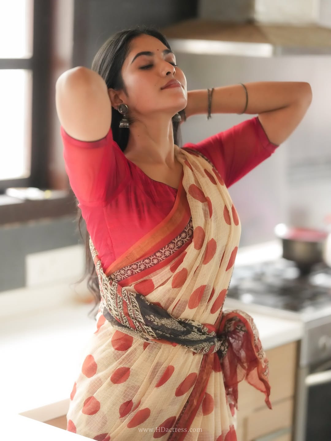 Gracy Thangavel in cream cotton saree with red polka dots