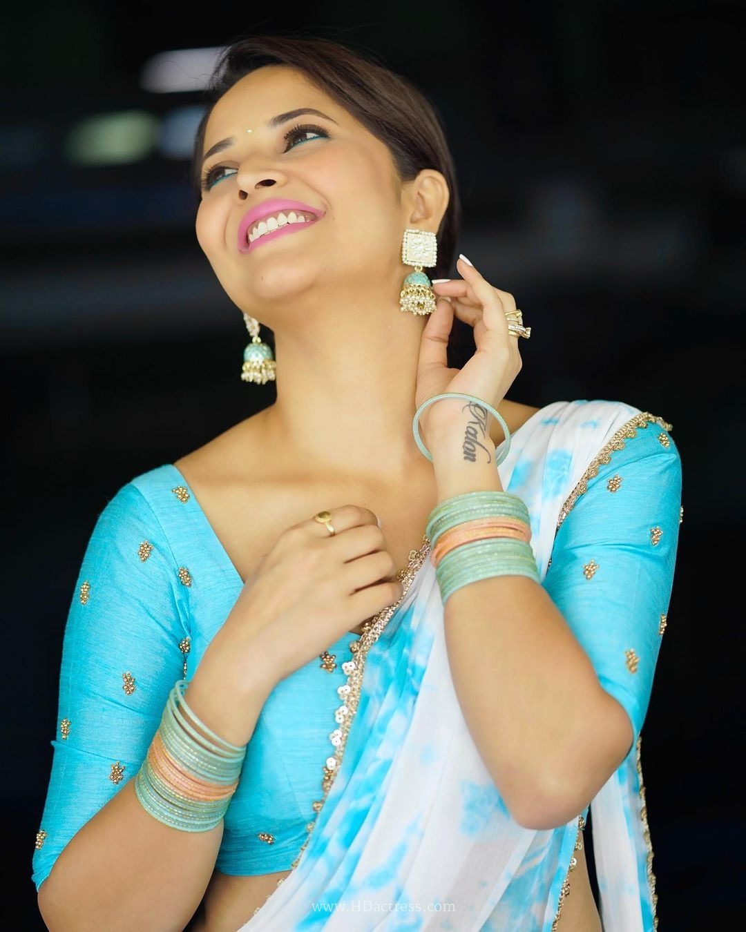 Anasuya Bharadwaj wearing sky blue white tie dye half saree Anasuya Bharadwaj wearing sky blue white tie dye half saree